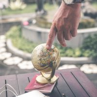 person-holding-terrestrial-globe-scale-model-taken-1079033